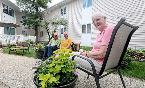 RUTH BONNEVILLE / WINNIPEG FREE PRESS

LOCAL - care homes

Joyce Church, a resident of Thorvaldson Care Centre, enjoys visiting with her daughter, Janis Brackman and her son-in-law Alan Brackman, in the outdoor patio space at her residence on Tuesday.  

What: Family members can now visit their loved ones in personal care homes (COVID-19 restrictions are changing).

See Gabby's story. 

.June 23,  2020