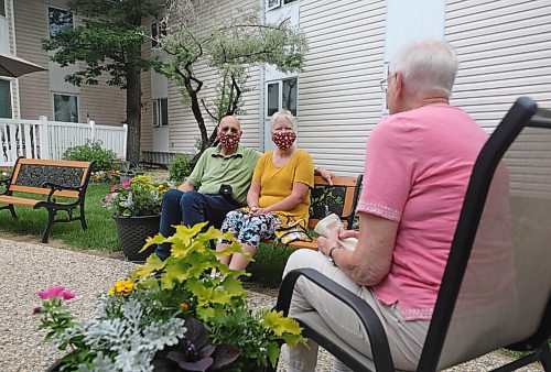 RUTH BONNEVILLE / WINNIPEG FREE PRESS

LOCAL - care homes

Joyce Church, a resident of Thorvaldson Care Centre, enjoys visiting with her daughter, Janis Brackman and her son-in-law Alan Brackman, in the outdoor patio space at her residence on Tuesday.  

What: Family members can now visit their loved ones in personal care homes (COVID-19 restrictions are changing).

See Gabby's story. 

.June 23,  2020