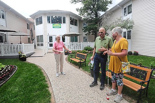 RUTH BONNEVILLE / WINNIPEG FREE PRESS

LOCAL - care homes

Joyce Church, a resident of Thorvaldson Care Centre,says good-bye to her daughter, Janis Brackman and her son-in-law Alan Brackman, in the outdoor patio space at her residence on Tuesday.  

What: Family members can now visit their loved ones in personal care homes (COVID-19 restrictions are changing).

See Gabby's story. 

.June 23,  2020