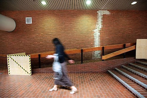 JOHN WOODS / WINNIPEG FREE PRESS
A person walks past some water damage and a closed off wheelchair ramp in the Portage and Main concourse in Winnipeg Tuesday, June 23, 2020. A city report requires the concourse to undergo major repairs.

Reporter: da silva