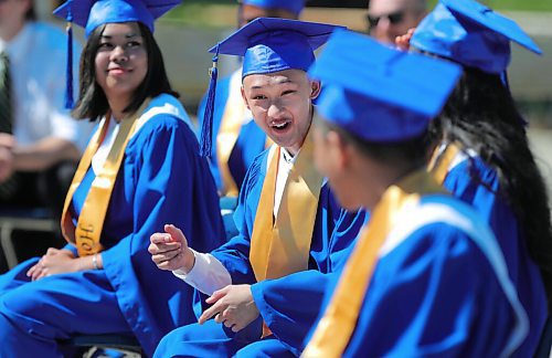 RUTH BONNEVILLE / WINNIPEG FREE PRESS

LOCAL - Drive-In Graduation at St. Maurice High School, 1639 Pembina Highway.

Photo of Perry Cheung all smiles as he attends his grad with his fellow students  during ceremony Wednesday.  

Graduating students at  St. Maurice High School attend an outdoor graduation ceremony in their school parking lot with their fellow students with social distancing measures in place on Wednesday.  Students sat in seats set apart while their families stayed in their vehicles behind them.  

See Gabby's story. 

.June 24,  2020