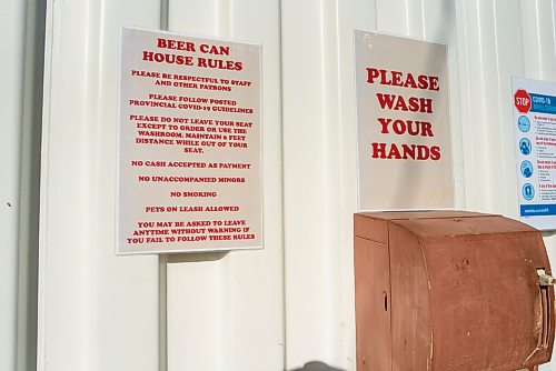 JESSE BOILY  / WINNIPEG FREE PRESS
A set of rules and a reminder for costumers to wash their hands at the Beer Can on Wednesday. The Beer Can is a patio spot where many Winnipegers are going to enjoy the summer and a drink. Wednesday, June 24, 2020.
Reporter: Melissa Martin