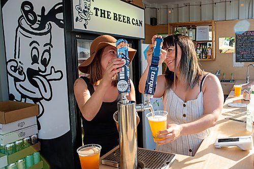 JESSE BOILY  / WINNIPEG FREE PRESS
Amber Nielsen, left, and Rachel Boese poor beers at the Beer Can on Wednesday. The Beer Can is a patio spot where many Winnipegers are going to enjoy the summer and a drink. Wednesday, June 24, 2020.
Reporter: Melissa Martin