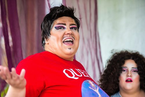 MIKAELA MACKENZIE / WINNIPEG FREE PRESS

Guncle Smokey Trixx Starr (left) and Olivia Limeheart pose for portraits on their porch in Winnipeg on Thursday, June 25, 2020. The two are stars of Synonym Art Consultation's drag safe grad video. For Eva Wasney story. 
Winnipeg Free Press 2020.