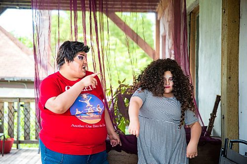 MIKAELA MACKENZIE / WINNIPEG FREE PRESS

Guncle Smokey Trixx Starr (left) and Olivia Limeheart pose for portraits on their porch in Winnipeg on Thursday, June 25, 2020. The two are stars of Synonym Art Consultation's drag safe grad video. For Eva Wasney story. 
Winnipeg Free Press 2020.