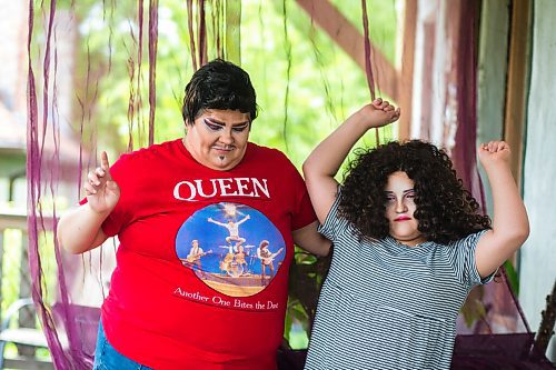 MIKAELA MACKENZIE / WINNIPEG FREE PRESS

Guncle Smokey Trixx Starr (left) and Olivia Limeheart pose for portraits on their porch in Winnipeg on Thursday, June 25, 2020. The two are stars of Synonym Art Consultation's drag safe grad video. For Eva Wasney story. 
Winnipeg Free Press 2020.