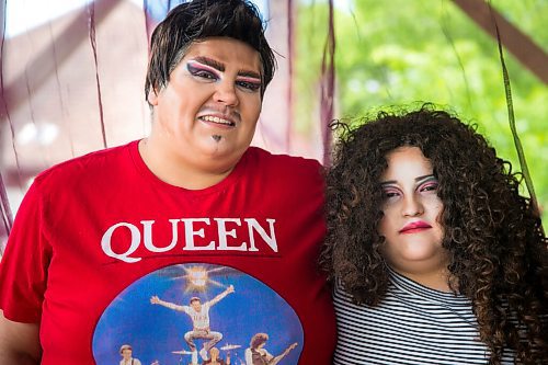 MIKAELA MACKENZIE / WINNIPEG FREE PRESS

Guncle Smokey Trixx Starr (left) and Olivia Limeheart pose for portraits on their porch in Winnipeg on Thursday, June 25, 2020. The two are stars of Synonym Art Consultation's drag safe grad video. For Eva Wasney story. 
Winnipeg Free Press 2020.