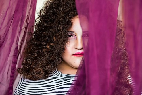 MIKAELA MACKENZIE / WINNIPEG FREE PRESS

Olivia Limeheart poses for portraits on the porch in Winnipeg on Thursday, June 25, 2020. The two are stars of Synonym Art Consultation's drag safe grad video. For Eva Wasney story. 
Winnipeg Free Press 2020.