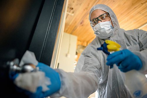 JESSE BOILY  / WINNIPEG FREE PRESS
Mariano Velazco cleans a touch point at Direct Focus Marketing on Thursday. Thursday, June 25, 2020.
Reporter: Ben Waldman