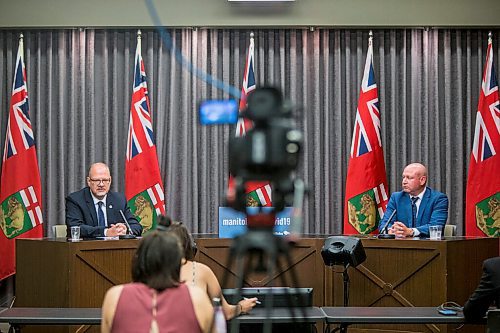 MIKAELA MACKENZIE / WINNIPEG FREE PRESS

Education minister Kelvin Goertzen (left) and chief provincial public health officer Brent Roussin speak to the media at the Manitoba Legislative Building in Winnipeg on Thursday, June 25, 2020. For Maggie story. 
Winnipeg Free Press 2020.