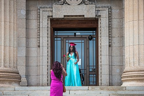 MIKAELA MACKENZIE / WINNIPEG FREE PRESS

Daniel McIntyre Collegiate Institute grad Jayden Cameron poses for photos for her mom, Cindy Cameron, after getting professional photos taken with a limo for free at the Manitoba Legislative Building in Winnipeg on Thursday, June 25, 2020. 
Winnipeg Free Press 2020.