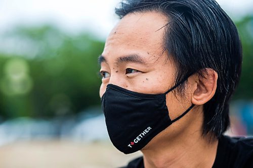 MIKAELA MACKENZIE / WINNIPEG FREE PRESS

Stephen Hua poses for a portrait with his Together Masks at the Manitoba Legislative Building in Winnipeg on Thursday, June 25, 2020. Hua started the mask business, along with a couple of other ones, when the hospitality and entertainment industry came to an abrupt halt with the pandemic. For Martin Cash story.
Winnipeg Free Press 2020.