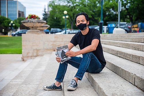 MIKAELA MACKENZIE / WINNIPEG FREE PRESS

Stephen Hua poses for a portrait with his Together Masks at the Manitoba Legislative Building in Winnipeg on Thursday, June 25, 2020. Hua started the mask business, along with a couple of other ones, when the hospitality and entertainment industry came to an abrupt halt with the pandemic. For Martin Cash story.
Winnipeg Free Press 2020.