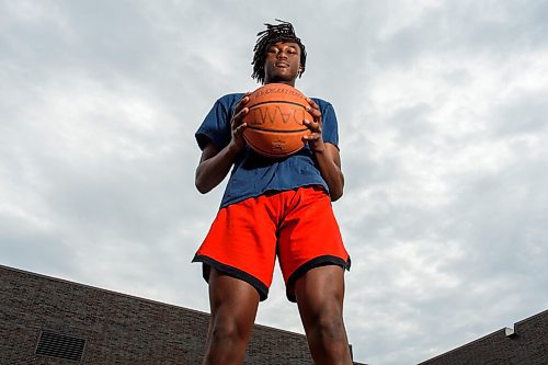 JESSE BOILY  / WINNIPEG FREE PRESS
Dami Farinloye, 18, is a top ranked high school boys basketball player but is uncertain where to go in the future due to the pandemic, poses for a portrait on Thursday. Thursday, June 25, 2020.
Reporter: Taylor Allen