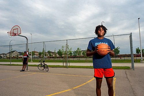 JESSE BOILY  / WINNIPEG FREE PRESS
Dami Farinloye, 18, is a top ranked high school boys basketball player but is uncertain where to go in the future due to the pandemic, poses for a portrait on Thursday. Thursday, June 25, 2020.
Reporter: Taylor Allen