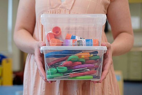 SHANNON VANRAES / WINNIPEG FREE PRESS
Glue sticks and scissors will have to be handled with extra care when students return to Kristy Frohwerk's kindergarten  classroom at Lord Nelson School next fall.