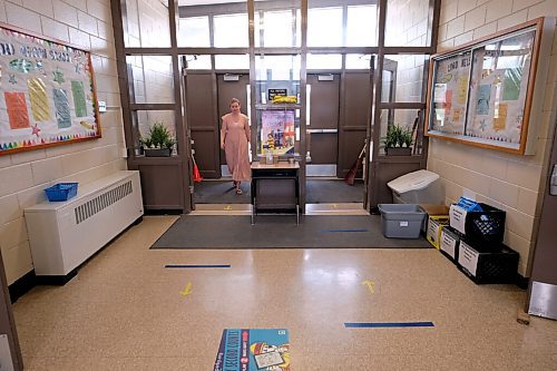 SHANNON VANRAES / WINNIPEG FREE PRESS
Stairs and hallways are marked with coloured tape at Lord Nelson School in Winnipeg to encourage social distancing. Photographed on June 25, 2020.