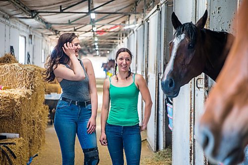 MIKAELA MACKENZIE / WINNIPEG FREE PRESS

Groom Paige Berard (left) and Trainer Tiffany Husbands pose with stakes winner Dazzling Gold at the Assiniboia Downs backstretch in Winnipeg on Friday, June 26, 2020. For George Williams story.
Winnipeg Free Press 2020.