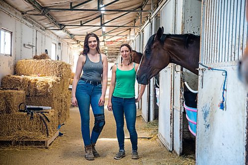 MIKAELA MACKENZIE / WINNIPEG FREE PRESS

Groom Paige Berard (left) and Trainer Tiffany Husbands pose with stakes winner Dazzling Gold at the Assiniboia Downs backstretch in Winnipeg on Friday, June 26, 2020. For George Williams story.
Winnipeg Free Press 2020.
