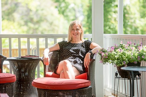 Mike Sudoma / Winnipeg Free Press
Lynn Skromeda, Executive Director of the Winnipeg Folk Festival, sits in her favourite spot on the porch of her house Friday morning. She uses her porch as an office space, as well as a spot to socialize.
June 26, 2020