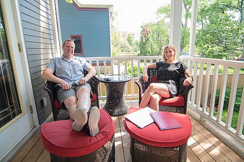 Mike Sudoma / Winnipeg Free Press
Lynn Skromeda, Executive Director of the Winnipeg Folk Festival and her partner, Jason Smith, enjoy some time on the porch of their home Friday morning 
June 26, 2020