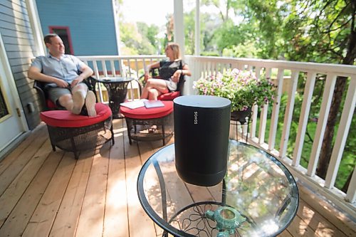 Mike Sudoma / Winnipeg Free Press
Lynn Skromeda, Executive Director of the Winnipeg Folk Festival and her partner, Jason Smith, enjoy some music as they on the porch of their home Friday morning 
June 26, 2020
