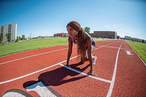 Mike Sudoma / Winnipeg Free Press
Kelvin track star, Rofiat Agboola practices sprinting at Victor Mager School in St Vital Friday afternoon
June 26, 2020