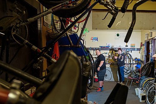 JESSE BOILY  / WINNIPEG FREE PRESS
Aaron Maciejko, left, and Charles Pearce, who are volunteers at Orioles Bike Cage, a community bicycle shop that helps people repair and maintain their bicycles, work bicycles on Friday. Friday, June 26, 2020.
Reporter: Aaron Epp