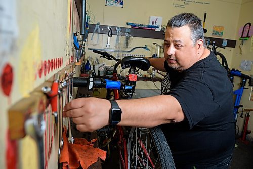JESSE BOILY  / WINNIPEG FREE PRESS
Aaron Maciejko, who is a volunteer at Orioles Bike Cage, a community bicycle shop that helps people repair and maintain their bicycles, works on a bicycle on Friday. Friday, June 26, 2020.
Reporter: Aaron Epp