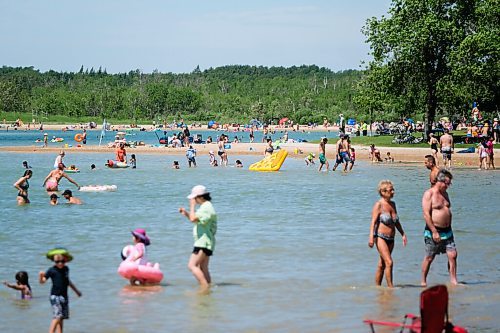 Daniel Crump / Winnipeg Free Press. Visitors at Birds Hill Park enjoy a swim at the Beach on a hot summer day. June 27, 2020.