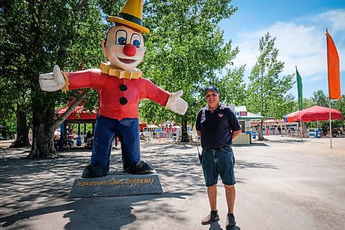 Daniel Crump / Winnipeg Free Press. Tinkertown owner, Randy Saluk, stands in front of the clown statue that welcomes visitors just inside the gates of the amusement park. June 27, 2020.