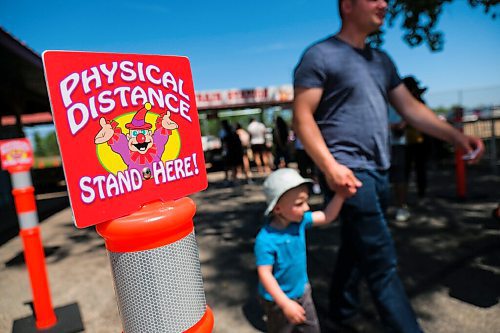 Daniel Crump / Winnipeg Free Press. A sign reminds visitors at Tinkertown to socially distance. June 27, 2020.