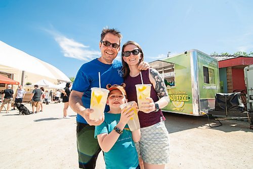 Mike Sudoma / Winnipeg Free Press
(Left to right) Dave, Doug and Rose Carlson cool off with a freshly squeezed lemonade from the Just a Little Squeeze lemonade truck at the St Norbert Farmers Market Saturday morning
June 27, 2020