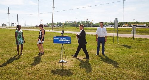 MIKE DEAL / WINNIPEG FREE PRESS
(from left), Audrey Gordon (Southdale), Janice Morley-Lecomte (Seine River), Infrastructure Minister Ron Schuler, Andrew Smith (Lagimodière)
Infrastructure Minister Ron Schuler announces that the province is planning to construct a new interchange to improve safety and the flow of traffic at the intersection of the perimeter hwy and St. Marys Road, using money from the $500-million Manitoba Restart Program. The press conference was held at the north east corner of the intersection close to the entrance to Maple Grove Park, Monday morning.
200629 - Monday, June 29, 2020.