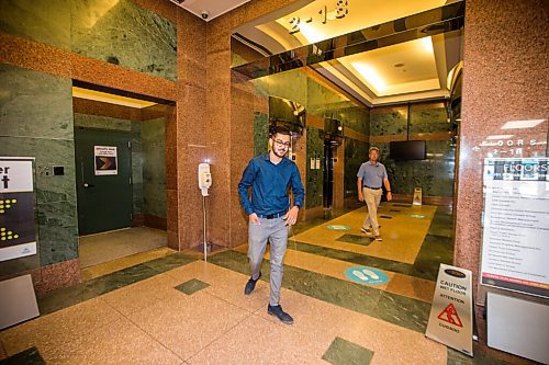 MIKAELA MACKENZIE / WINNIPEG FREE PRESS

Jai Gandhi gets off to the elevators at 201 Portage, with new COVID-19 measures in place, in Winnipeg on Monday, June 29, 2020. For Gabrielle Piche story.
Winnipeg Free Press 2020.