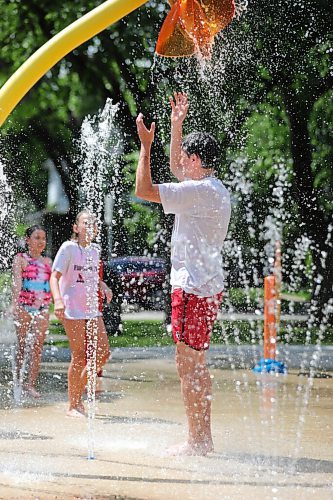 RUTH BONNEVILLE / WINNIPEG FREE PRESS
 
Local - Weather Standup Splash Pad

Luc Labelle cools himself while spending time with his god child at Provencher Park Spray Pad during a heat wave in Winnipeg and surrounding areas on Monday. 




.June 29,  2020