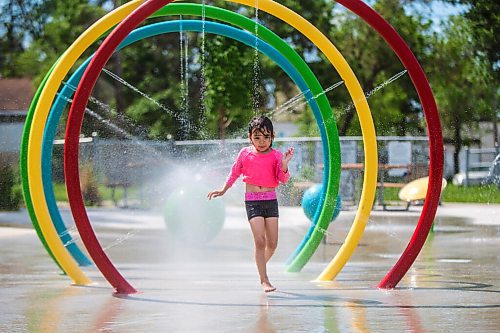 MIKAELA MACKENZIE / WINNIPEG FREE PRESS

Julia Thomas, four, plays at the splash pad at Sergeant Tommy Prince Place in Winnipeg on Tuesday, June 30, 2020. Standup.
Winnipeg Free Press 2020.