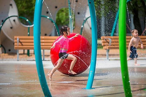 MIKAELA MACKENZIE / WINNIPEG FREE PRESS

Julia Thomas, four, plays at the splash pad at Sergeant Tommy Prince Place in Winnipeg on Tuesday, June 30, 2020. Standup.
Winnipeg Free Press 2020.