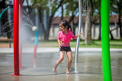 MIKAELA MACKENZIE / WINNIPEG FREE PRESS

Julia Thomas, four, plays at the splash pad at Sergeant Tommy Prince Place in Winnipeg on Tuesday, June 30, 2020. Standup.
Winnipeg Free Press 2020.