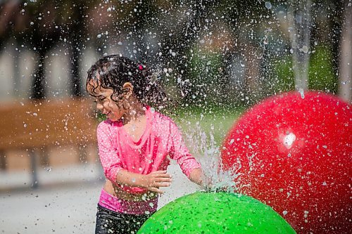 MIKAELA MACKENZIE / WINNIPEG FREE PRESS

Julia Thomas, four, plays at the splash pad at Sergeant Tommy Prince Place in Winnipeg on Tuesday, June 30, 2020. Standup.
Winnipeg Free Press 2020.