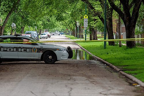 JESSE BOILY  / WINNIPEG FREE PRESS
Police look into a possible homicide at Salter and Flora on Wednesday. A resident nearby said that this was the fourth homicide on this block in four years. Wednesday, July 1, 2020.
Reporter: