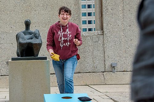 JESSE BOILY  / WINNIPEG FREE PRESS
Jessika Betke plays a game of cornhole and enjoys the newly opened rooftop at the Winnipeg Art Gallery on Wednesday. Wednesday, July 1, 2020.
Reporter: