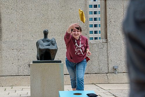 JESSE BOILY  / WINNIPEG FREE PRESS
Jessika Betke plays a game of cornhole and enjoys the newly opened rooftop at the Winnipeg Art Gallery on Wednesday. Wednesday, July 1, 2020.
Reporter: