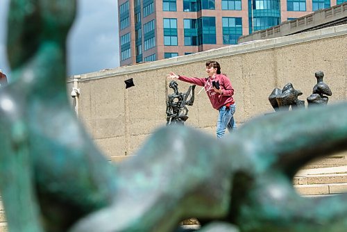 JESSE BOILY  / WINNIPEG FREE PRESS
Jessika Betke plays a game of cornhole and enjoys the newly opened rooftop at the Winnipeg Art Gallery on Wednesday. Wednesday, July 1, 2020.
Reporter: