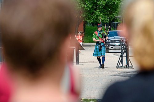 JESSE BOILY  / WINNIPEG FREE PRESS
Emil Flach, 15, played the bag pipes to people at the Forks on Wednesday. The pop up show was put on by The St. Andrew's Society of Winnipeg as part of their Pop-up Piper program. Wednesday, July 1, 2020.
Reporter: