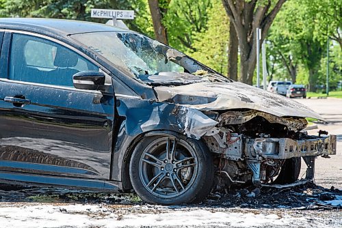 JESSE BOILY  / WINNIPEG FREE PRESS
A car was on fire northbound on McPhillips and Church Ave on Wednesday. Wednesday, July 1, 2020.
Reporter: