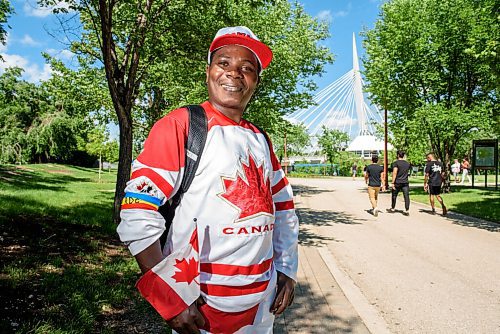 JESSE BOILY  / WINNIPEG FREE PRESS
Hubert Kabasha went to the forks to celebrate Canada Day on Wednesday. Kabasha said his friends call him a Congadian because he got his Canadian citizenship and is from the Congo. He said its a happy time for him as Congos Independence Day was yesterday and being close to Canada Day is a bonus. Wednesday, July 1, 2020.
Reporter: