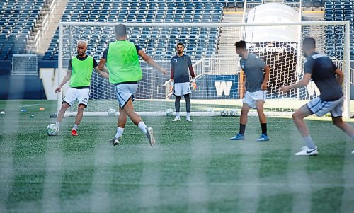 MIKE DEAL / WINNIPEG FREE PRESS
Valour FC goalie, James Pantemis (1), watches, winger, Stefan Cebara pass the ball during practice at IG Field Thursday morning.
200702 - Thursday, July 02, 2020.