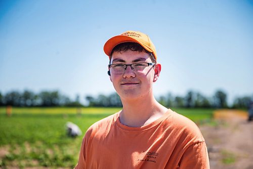 MIKAELA MACKENZIE / WINNIPEG FREE PRESS

Thomas Campbell, employee at Boonstra Farms, poses for a photo on opening day for strawberry picking on Thursday, July 2, 2020. For Gabrielle Piche story.
Winnipeg Free Press 2020.