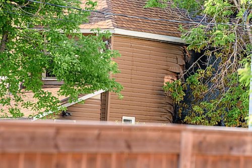 JESSE BOILY  / WINNIPEG FREE PRESS
A home was on fire on Flora Ave between Salter and Aikins on Thursday. One resident who neighboured the home (only would say his name is Bob) said he heard what was like an explosion then saw smoke from the home. Thursday, July 2, 2020.
Reporter: